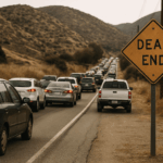 Gridlock at the Edge of the Moreno Valley Foothills Traffic jam on a narrow rural road with a "Dead End" sign, surrounded by dry hills in Moreno Valley